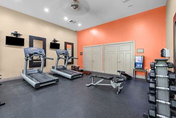 24-Hour fitness center with cardio & weight equipment