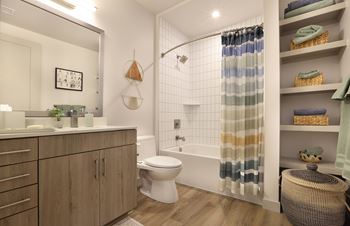 Bathroom with white subway tile and open shelving