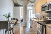 Los Angeles apartment for rent - gorgeous modern kitchen in Maxfield loft with light wood cabinets, modern fixtures, updated appliances, and beautiful blue tile backsplash