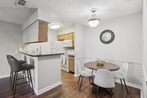 Daytona Beach apartment for rent - A kitchen with a table and chairs.