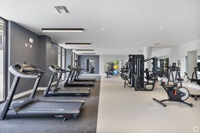 Miami apartment for rent - A gym with treadmills and exercise bikes.