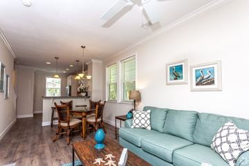 Marathon apartment for rent - A living room with a blue couch and a wooden coffee table.