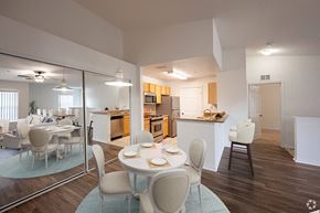 Orange City apartment for rent - a dining room and kitchen with a table and chairs