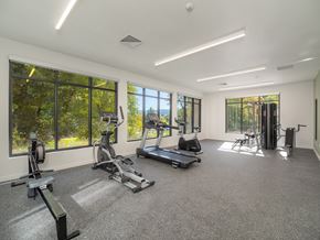 Roseburg apartment for rent - the gym has plenty of exercise equipment and windows
