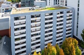 Portland apartment for rent - an aerial view of a building with a green roof