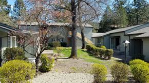 Rogue River apartment for rent - a view of a yard in front of a house