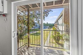 Medford apartment for rent - a balcony with a view of a yard and a building
