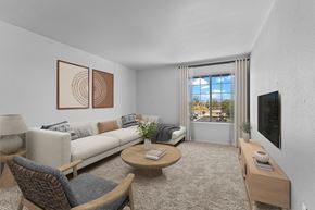 Wickenburg apartment for rent - A living room with a couch, chairs, and a coffee table.