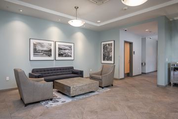 Happy Valley apartment for rent - a living room with couches and chairs and a table