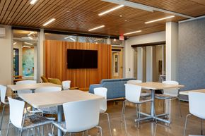 Happy Valley apartment for rent - a conference room with tables and chairs and a television