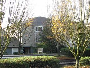 Portland apartment for rent - a large house with a mountain in the background