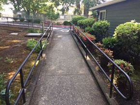 Portland apartment for rent - a walkway in a garden with a house
