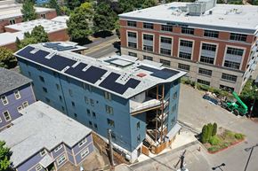 Portland apartment for rent - an aerial view of a building with a blue roof