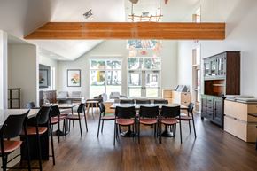 Oregon City apartment for rent - a dining room with tables and chairs and a large window