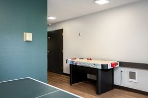 Mcminnville apartment for rent - a room with a pool table and a tennis court