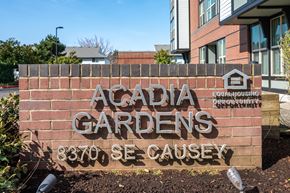 Happy Valley apartment for rent - a sign for acadia gardens in front of a building
