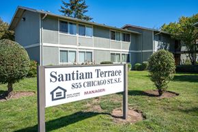 Albany apartment for rent - A sign for Santiam Terrace in front of a building.