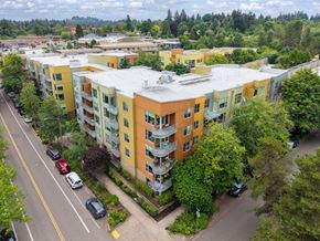 Portland apartment for rent - Apartment complex with cars parked in front.