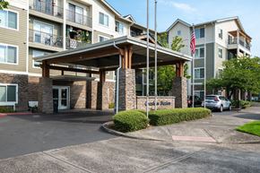 Gresham apartment for rent - The entrance to a building with a sign that reads "Crest Station.".