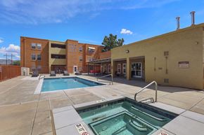 Los Ranchos De Alebuquerque apartment for rent - A pool with a sign that says 3-4-1 on it.