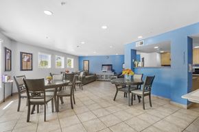Albuquerque apartment for rent - A dining room with a table set for six.