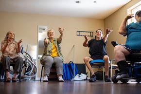 Marysville apartment for rent - Four elderly people are exercising in a gym.