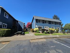 Lincoln City apartment for rent - A blue house with a white trim and a grey roof.