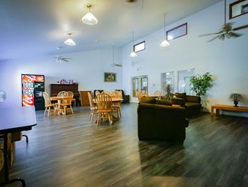 Community room - community room includes full kitchen, dining room, living room with cable, and coffee bar.