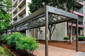 Portland apartment for rent - an exterior view of the rosemary tower condominiums in front of a building