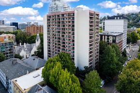 Portland apartment for rent - an aerial view of a tall building in a city