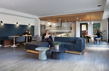 Community room with communal kitchen, tv, bathrooms, and ping pong table