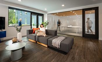 Community room with communal kitchen, tv, bathrooms, and ping pong table