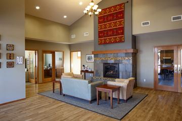 The Dalles apartment for rent - a living room with a fireplace and a couch