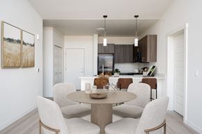 Beaverton apartment for rent - A modern dining room with a table set for six.