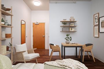 Portland apartment for rent - a living room and dining room with a table and chairs