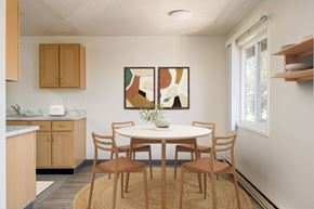 Milwaukie apartment for rent - A dining room with a round table and chairs.