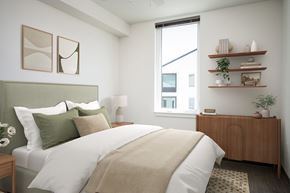 Salem apartment for rent - a bedroom with a large bed and a window