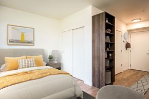 Portland apartment for rent - a bedroom with a bed and a closet