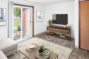Mcminnville apartment for rent - a living room with white walls and a sliding glass door
