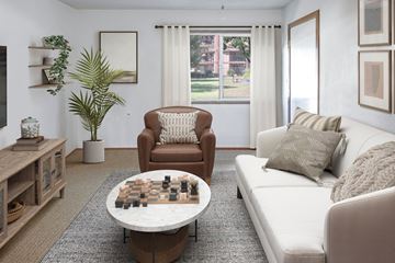 Mcminnville apartment for rent - a living room with a couch and a table with a chess board