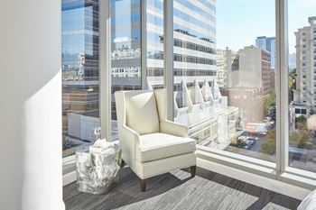 Floor-to-ceiling glass with operable windows in every apartment