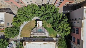 Albuquerque apartment for rent - A bird's eye view of a courtyard surrounded by buildings.