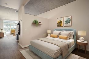 Portland apartment for rent - a bedroom with a bed and a closet