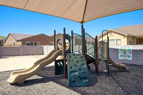 Coolidge apartment for rent - A playground with a slide and a climbing structure.