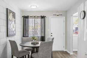 Sarasota apartment for rent - A dining room with a table and chairs.