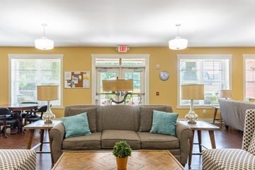 Huntsville apartment for rent - A living room with a grey couch and a coffee table.