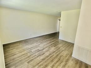 Sarasota apartment for rent - living room with hardwood-inspired flooring