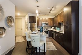 Orlando apartment for rent - Kitchen with island and custom cabinetry  at LandonHouse Apartments in Lake Nona, Orlando, FL 32827