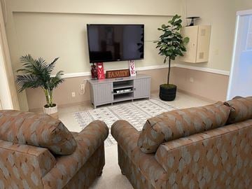 Cutler Bay apartment for rent - a living room with two couches and a television
