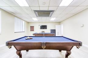 Jacksonville apartment for rent - pool tables and TV in resident lounge area